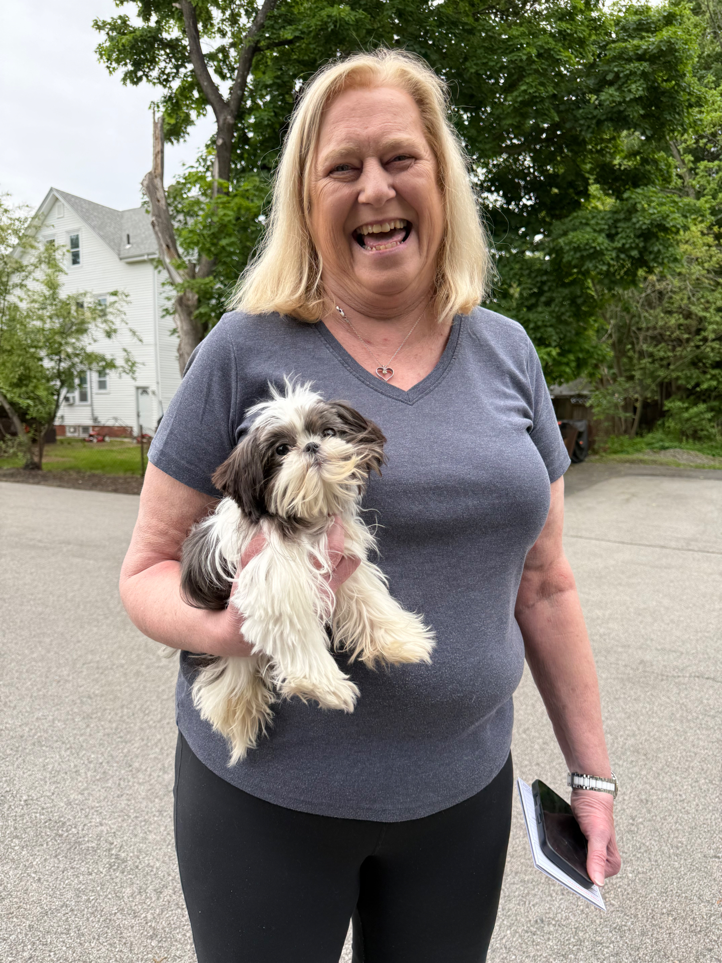 Happy customer with their new puppy