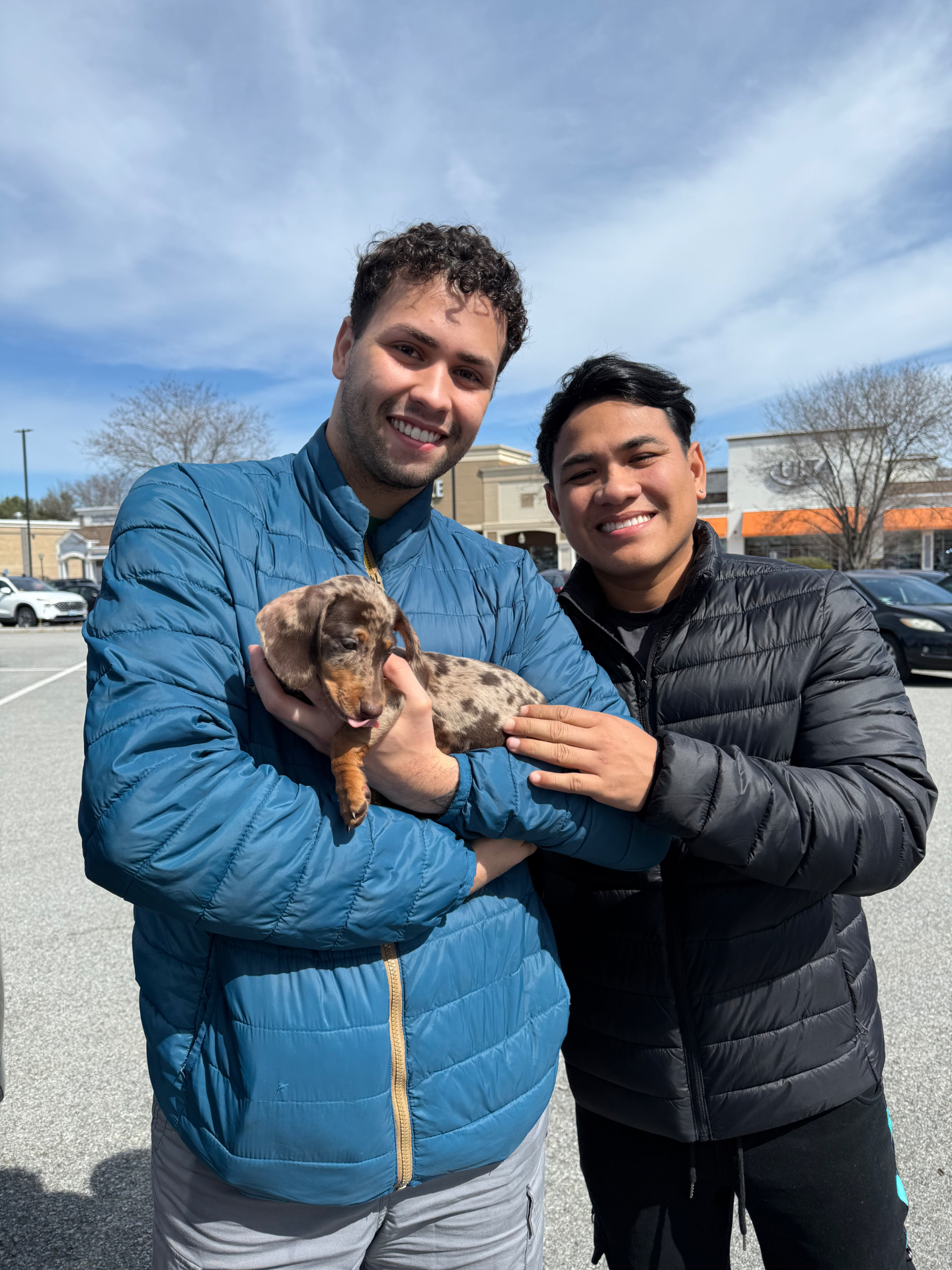 Happy customer with their new puppy