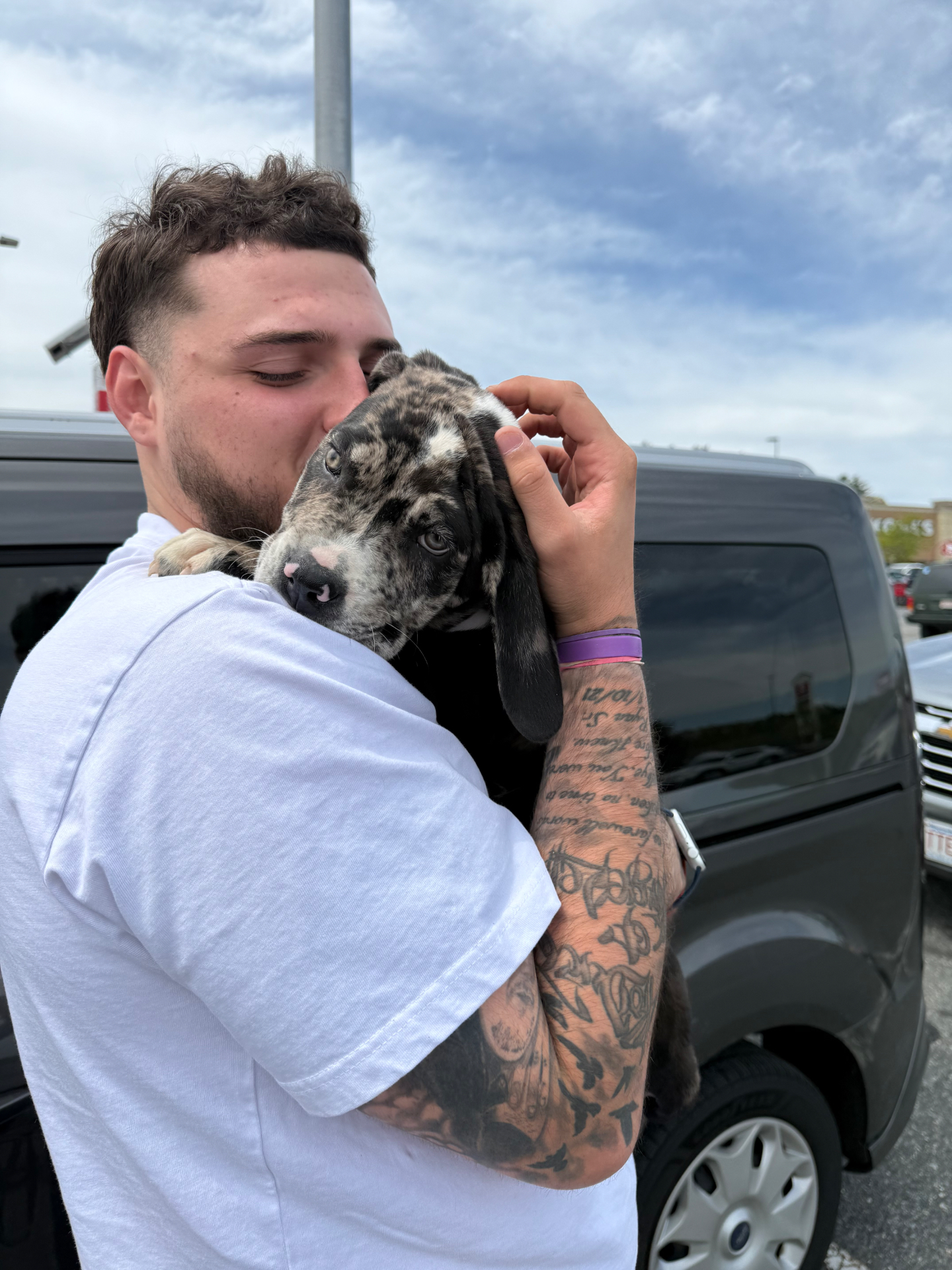 Happy customer with their new puppy
