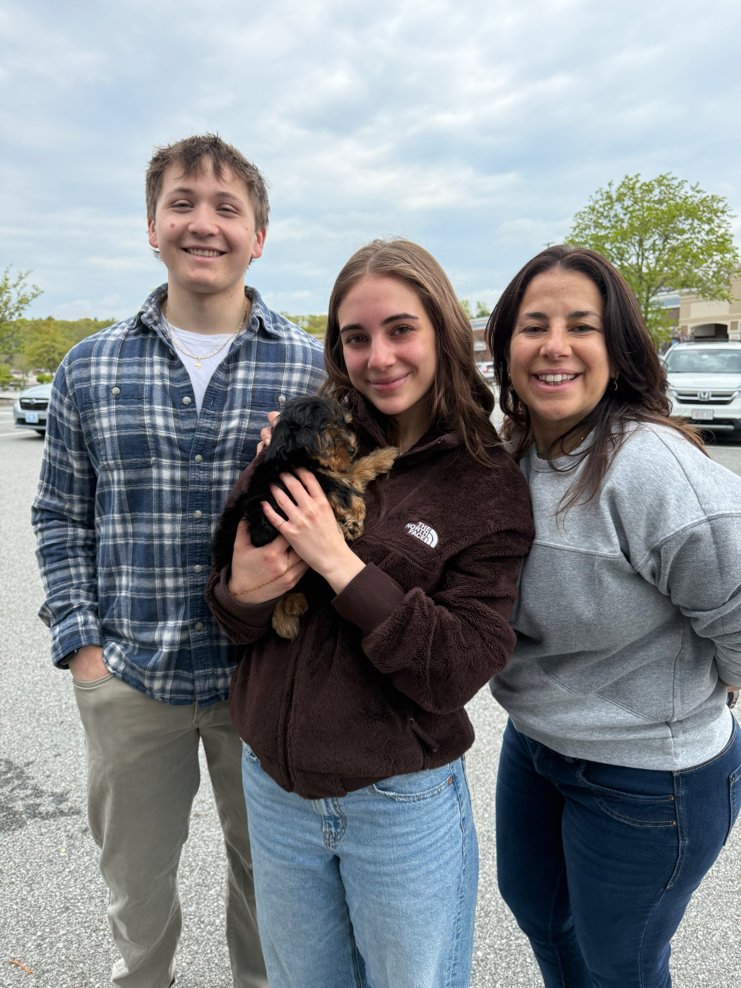 Happy customer with their new puppy