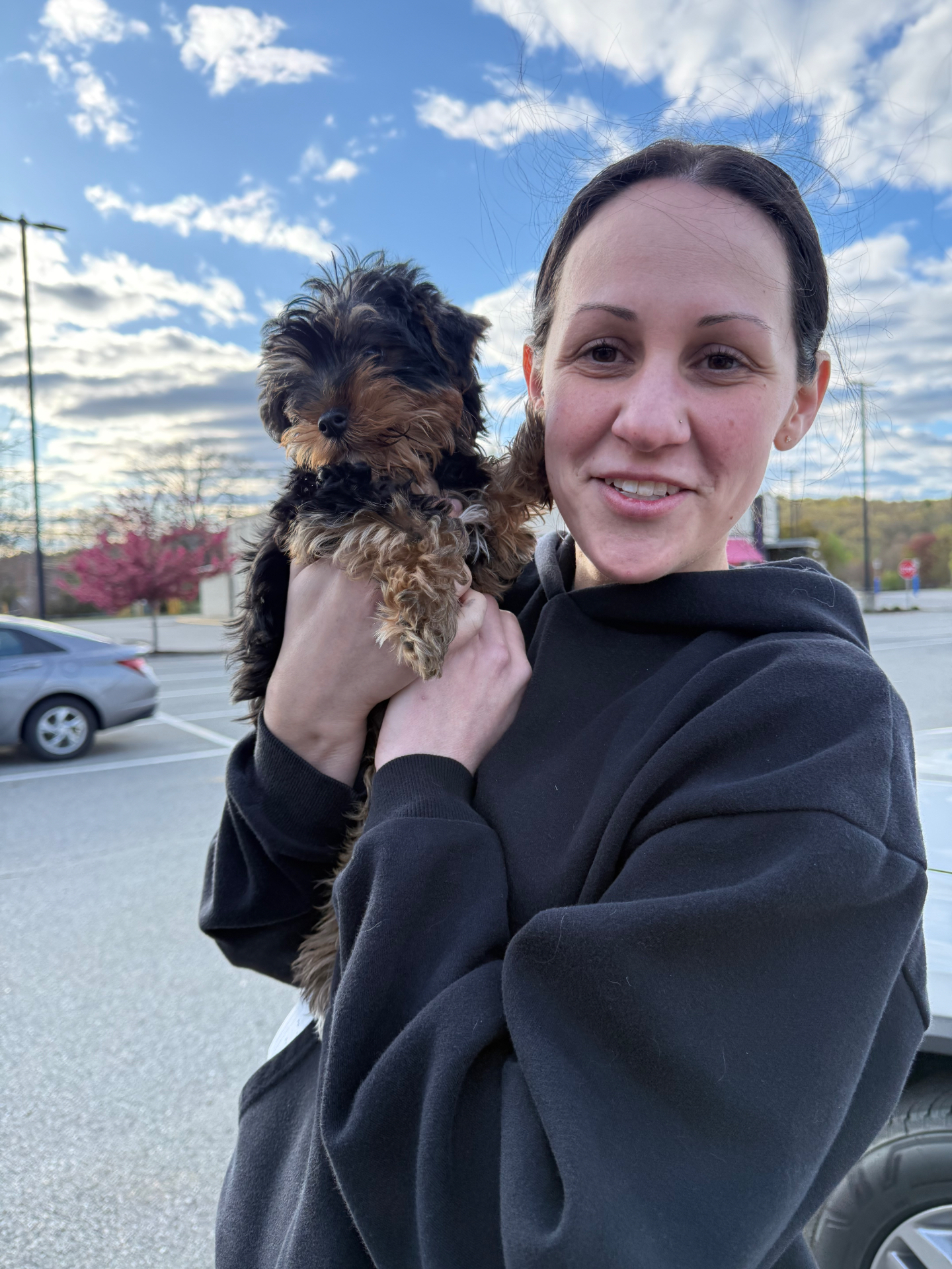 Happy customer with their new puppy