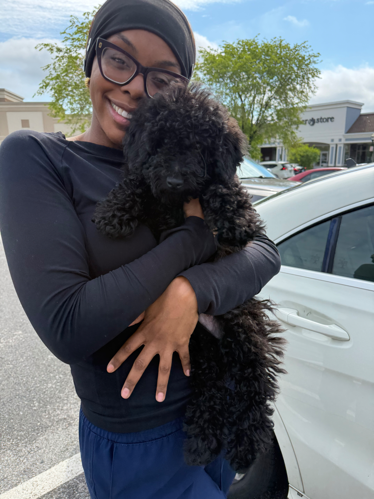 Happy customer with their new puppy